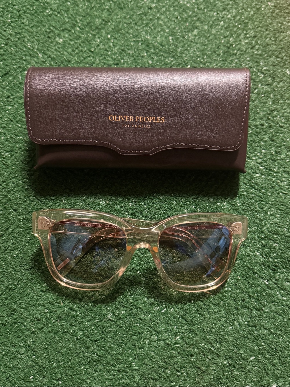 Oliver Peoples Translucent Pink Cat-Eye Sunglasses with Blue-Tinted Lenses